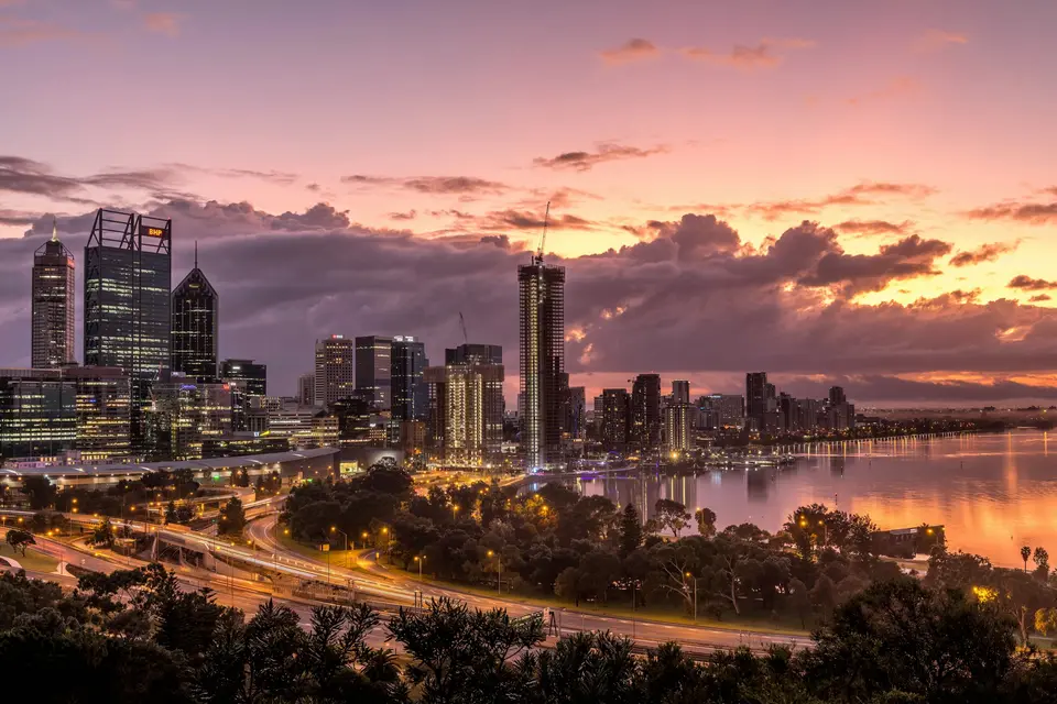 Perth city skyline and the Swan River at dusk